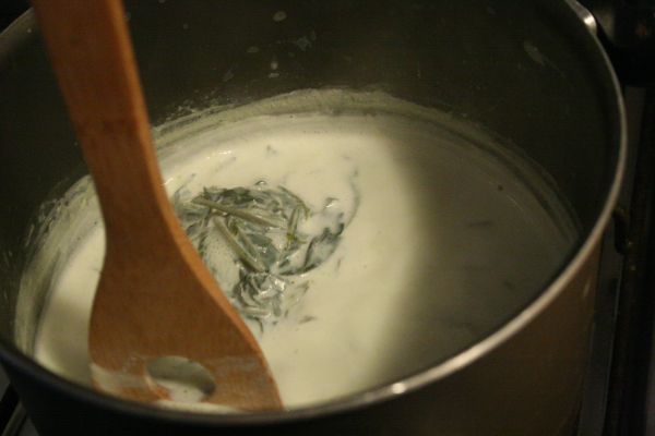 Cook the milk until it turns green and its texture becomes a little thicker